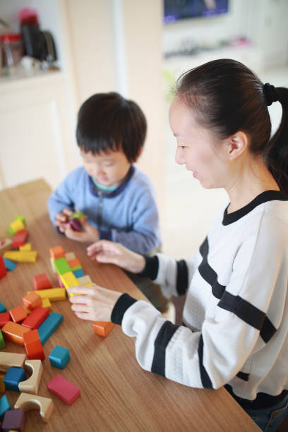 istock Cute asian Children playing with blocks 670468526
