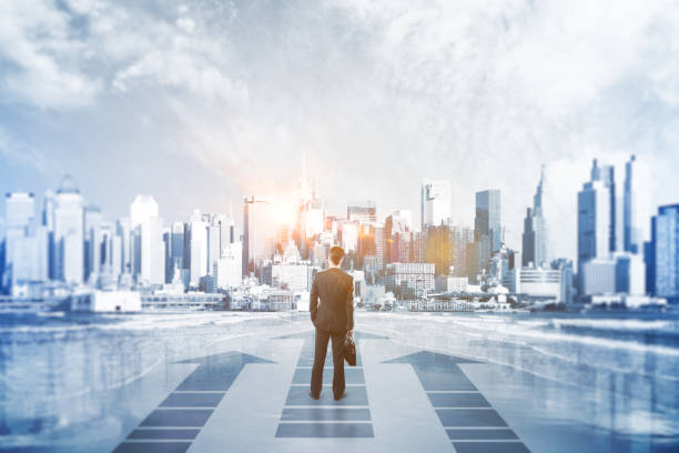 istock Man with arrows in city 670476548