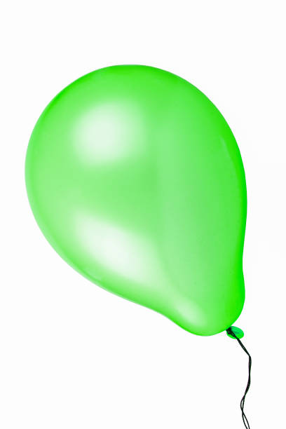 istock Flying green balloon isolated on white background 670480474