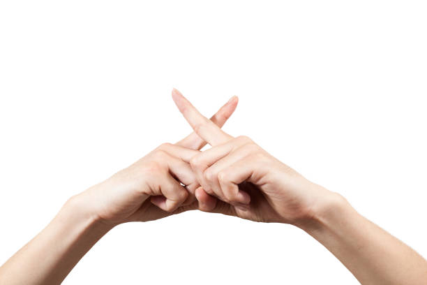 crossed hand finger of fail sign on white backgrounds