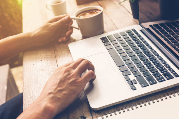 istock Hands of business man typing on a laptop 670487452