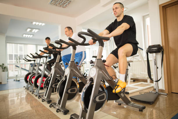 istock People exercising in the gym 670488012