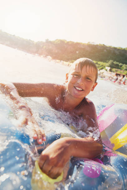 istock Happy Boy at the Beach 670494772
