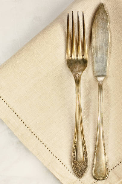istock Overhead photo of vintage fork and knife with copyspace 670494958