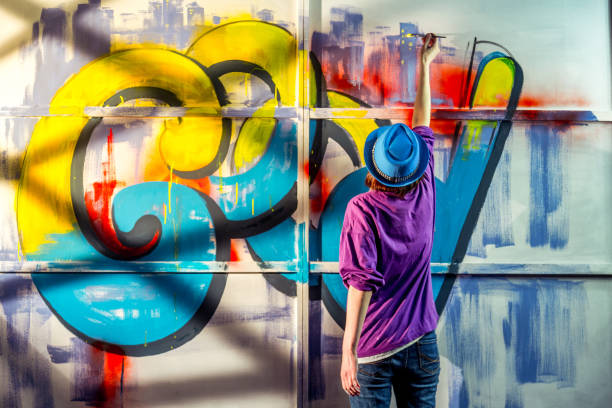 Woman Artist Create Graffiti