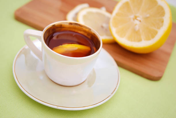 istock A cup of aromatic black tea with lemon 670506942