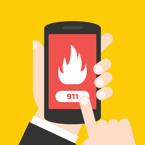 istock Emergency call 911 concept. Hand holding mobile phone with emergency number on the screen. 670510002