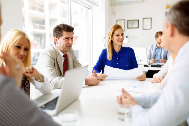 istock Succeful business partners brainstorming in office 670511280