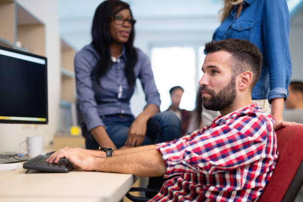 istock Corporate coworkers brainstorming in  software developement company 670516834