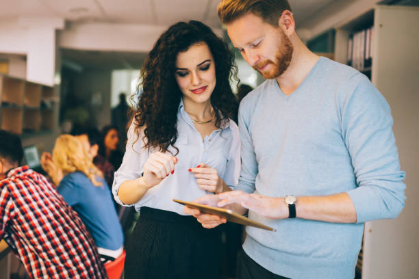 istock Corporate coworkers brainstorming in  software developement company 670517764