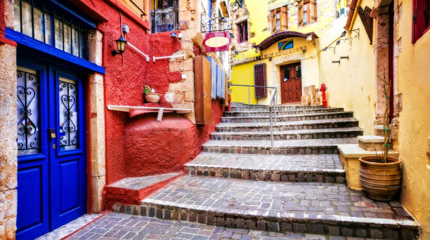 Colors of Greece series - vivid streets of old Chania town, Crete island Traditional street restaurants and streets of Greece. Crete island crete photos stock pictures, royalty-free photos & images