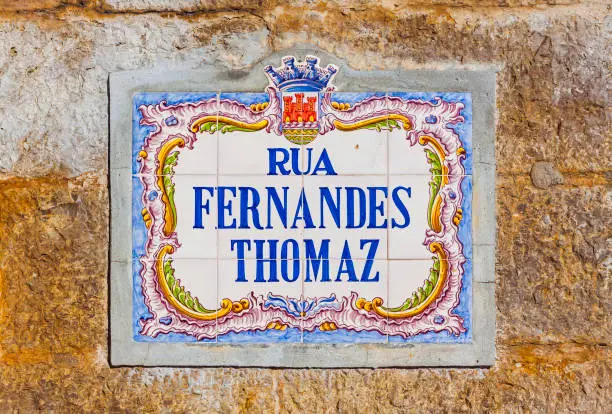 Beautiful typical plate with the name of street in Lisbon city, Portugal