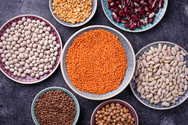 istock Various legumes. Chickpeas, red lentils, black lentils, yellow peas and beans 670532258