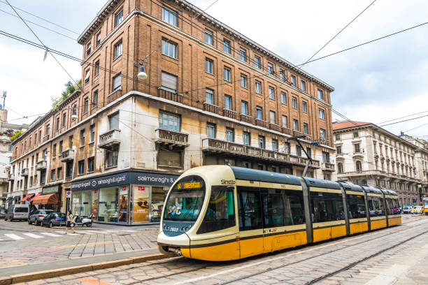 tranvía moderno en las calles de milán, italia - cable car driver transportation occupation tramway fotografías e imágenes de stock