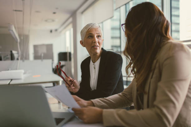 istock Businesswomen working in the office 670535224