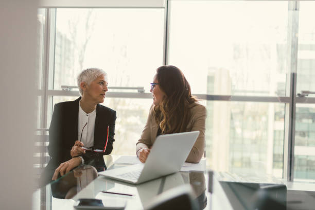 istock Businesswomen working in the office 670535242
