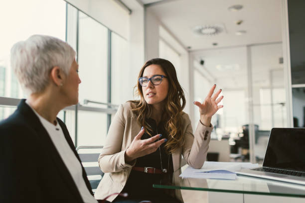 istock Businesswomen working in the office 670535268
