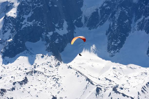 istock Paraglider above the Mont Blanc scenic area 670540110