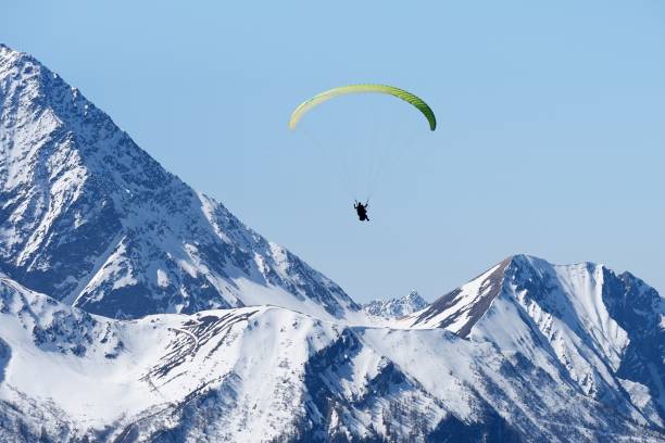 istock Paraglider above the Mont Blanc main peak 670540152