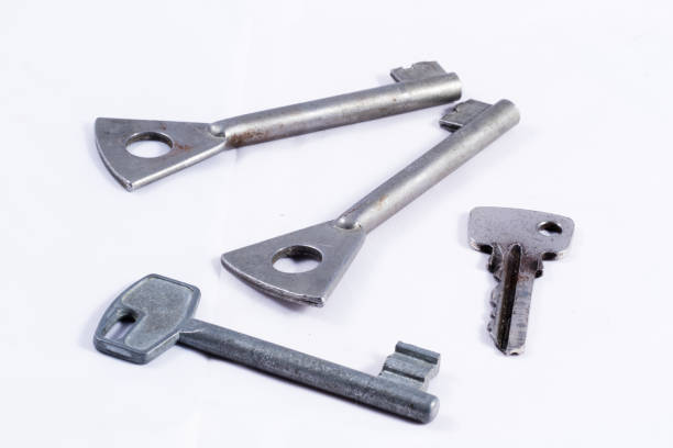 istock Old metal keys on a white background 670540200