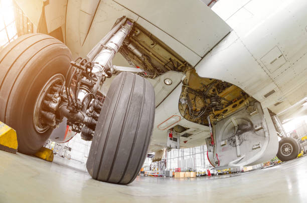 istock Landing gear airplane in hangar chassis rubber close-up 670544084