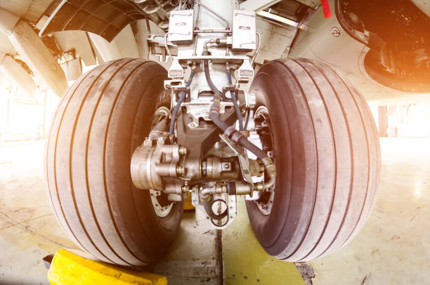 istock Landing gear airplane in hangar chassis rubber close-up 670544438