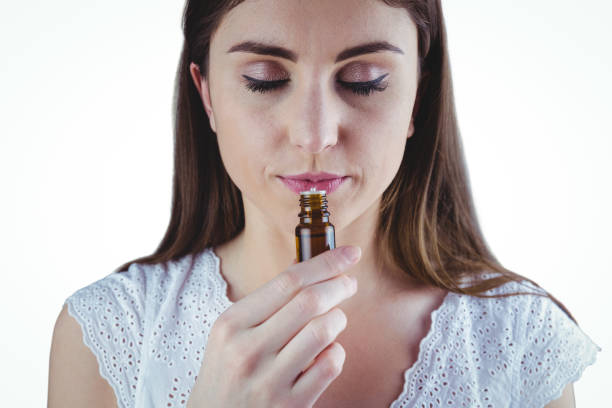 istock Pretty woman taking alternative tincture 670563002