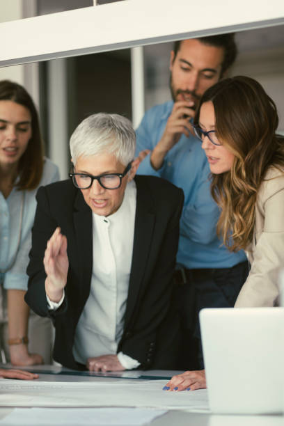 istock Architects and investors on meeting 670563424