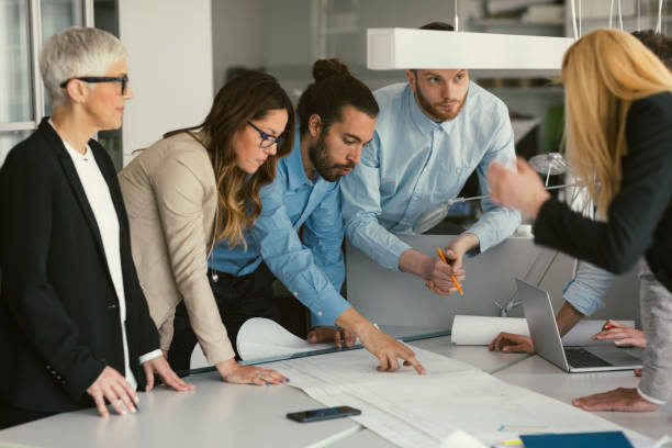istock Architects and investors on meeting 670563484