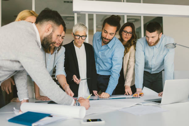 istock Architects and investors on meeting 670563880