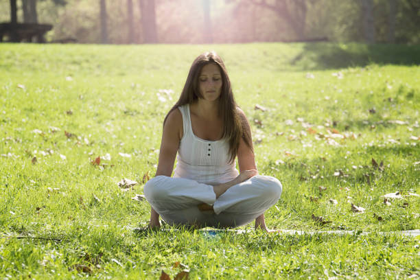 istock Girl doing yoga 670564256