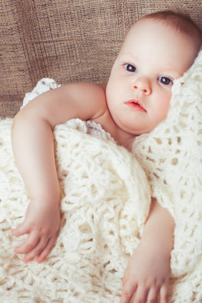 istock Child wrapped in a blanket 670564938
