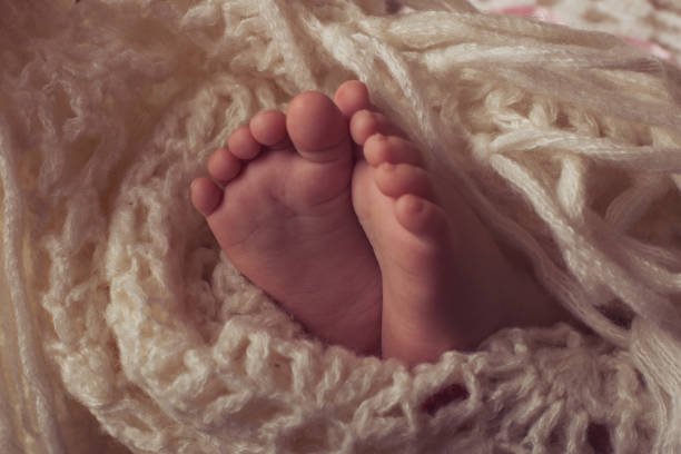 istock Little baby legs 670564962