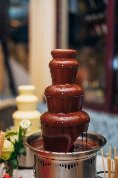 istock Chocolate fountain on the table 670567952