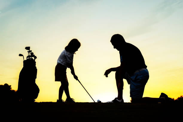 istock Fahter and Daughter Golf 670570586
