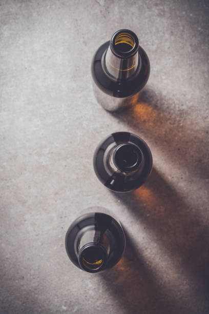 Beer bottles on dark table
