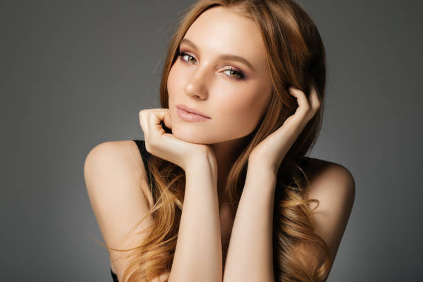 istock Young beautiful woman on light background 670577872
