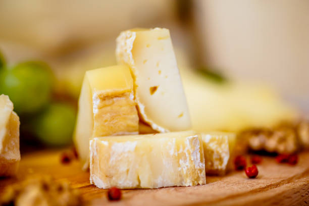 istock Different types of Italian cheeses (Parmesan, Gorgonzola, Roquefort) are on the Board. Macro. 670578582