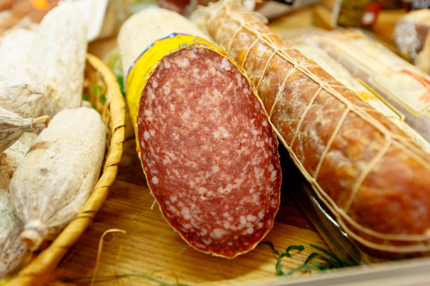 istock Various Italian sausages lying on the counter 670578692