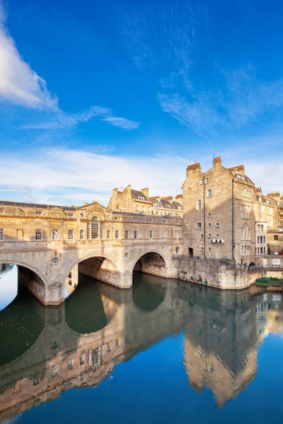 Pulteney Bridge and River Avon in Bath England UK Stock photograph of the landmark Pulteney Bridge above River Avon in Bath, England, United Kingdom. bath england photos stock pictures, royalty-free photos & images