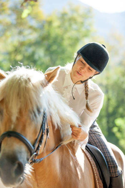 istock Riding and Petting the Horse 670582012
