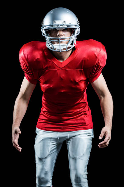 istock American football player standing in position 670591378