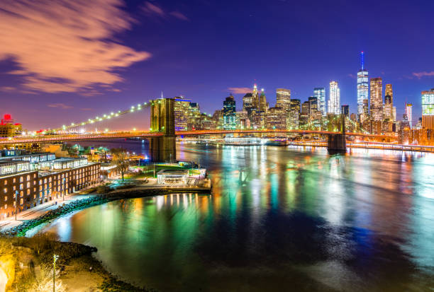 Quiet park in the city The Brooklyn Bridge Park is quite and beautiful at night. The Brooklyn Bridge, the East river and the One World Trade Center can be seen. new york marathon photos stock pictures, royalty-free photos & images