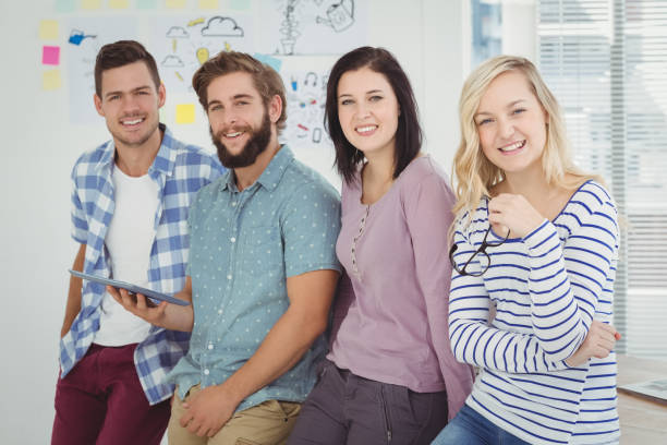 istock Portrait of smiling business team 670611032