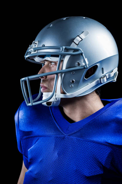 istock Sportsman with helmet looking away 670625540