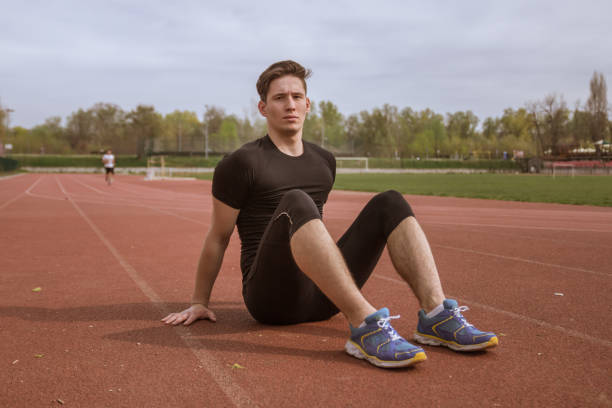 istock one young man, resting relaxing, outdoors fitness athlete 670636130