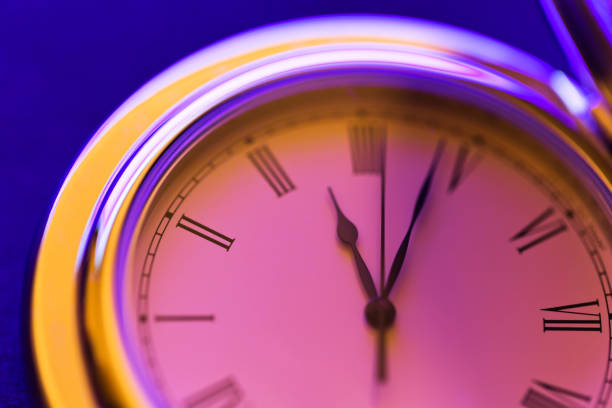 Time and infinity concept of clock face and glowing light