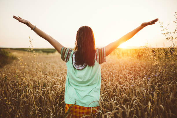 istock Woman enjoying the sun 670657416