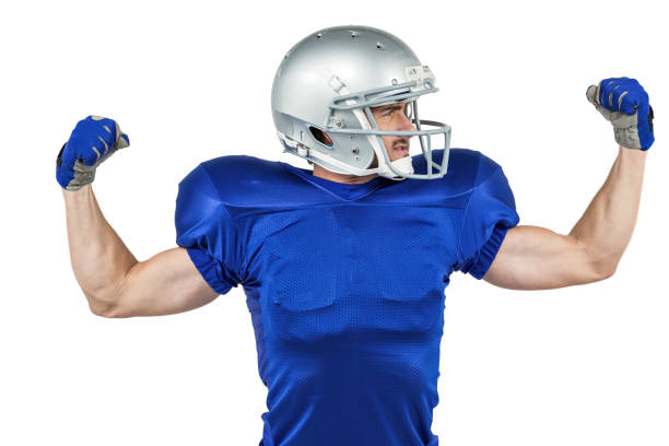 istock American football player flexing muscles 670661732