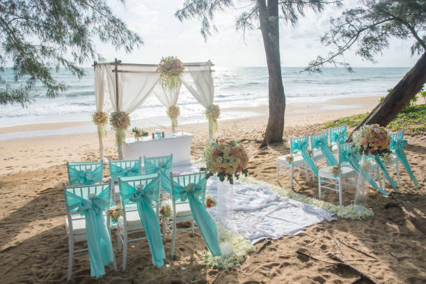istock Romantic wedding ceremony on the beach under the pines. 670665012